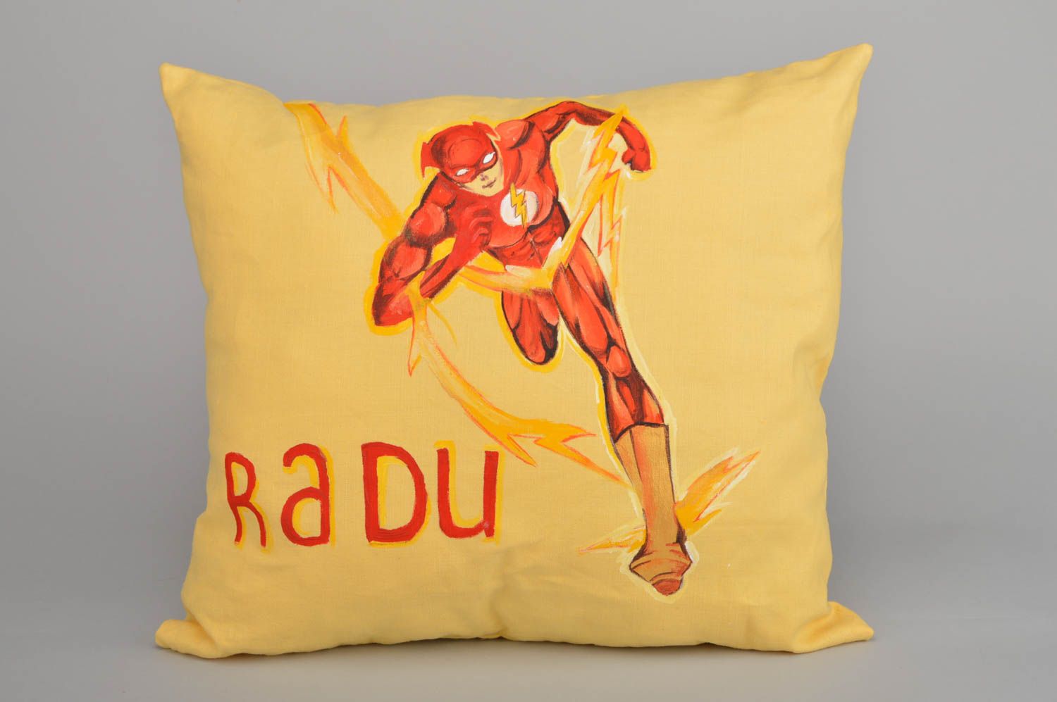 Handmade decorative throw pillow sewn of cotton yellow and red with name Radu photo 1