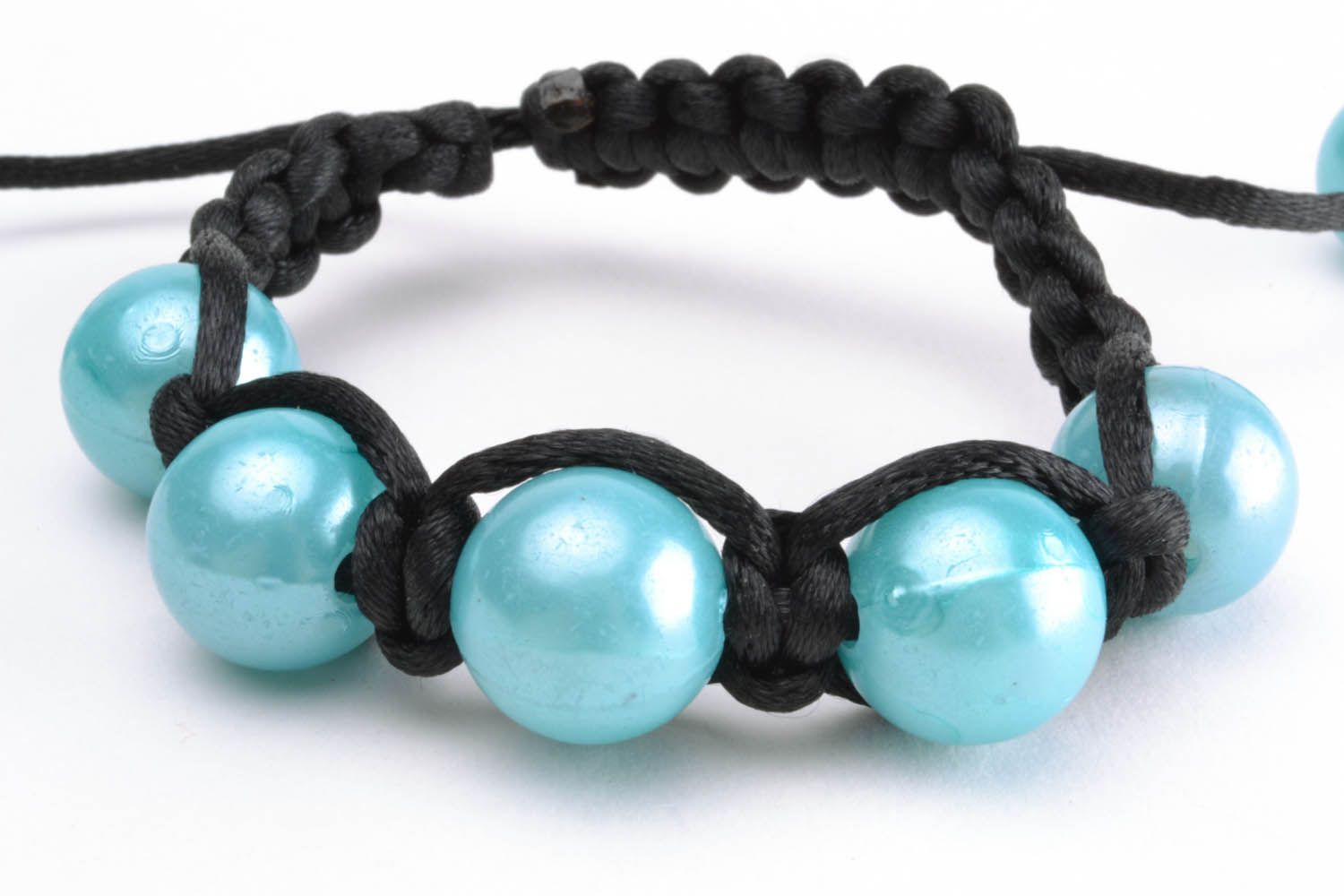 Braided bracelet with blue beads photo 2