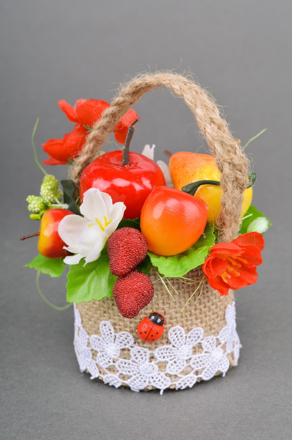 Handmade woven sisal basket with artificial fruit and flowers composition for home decor photo 2