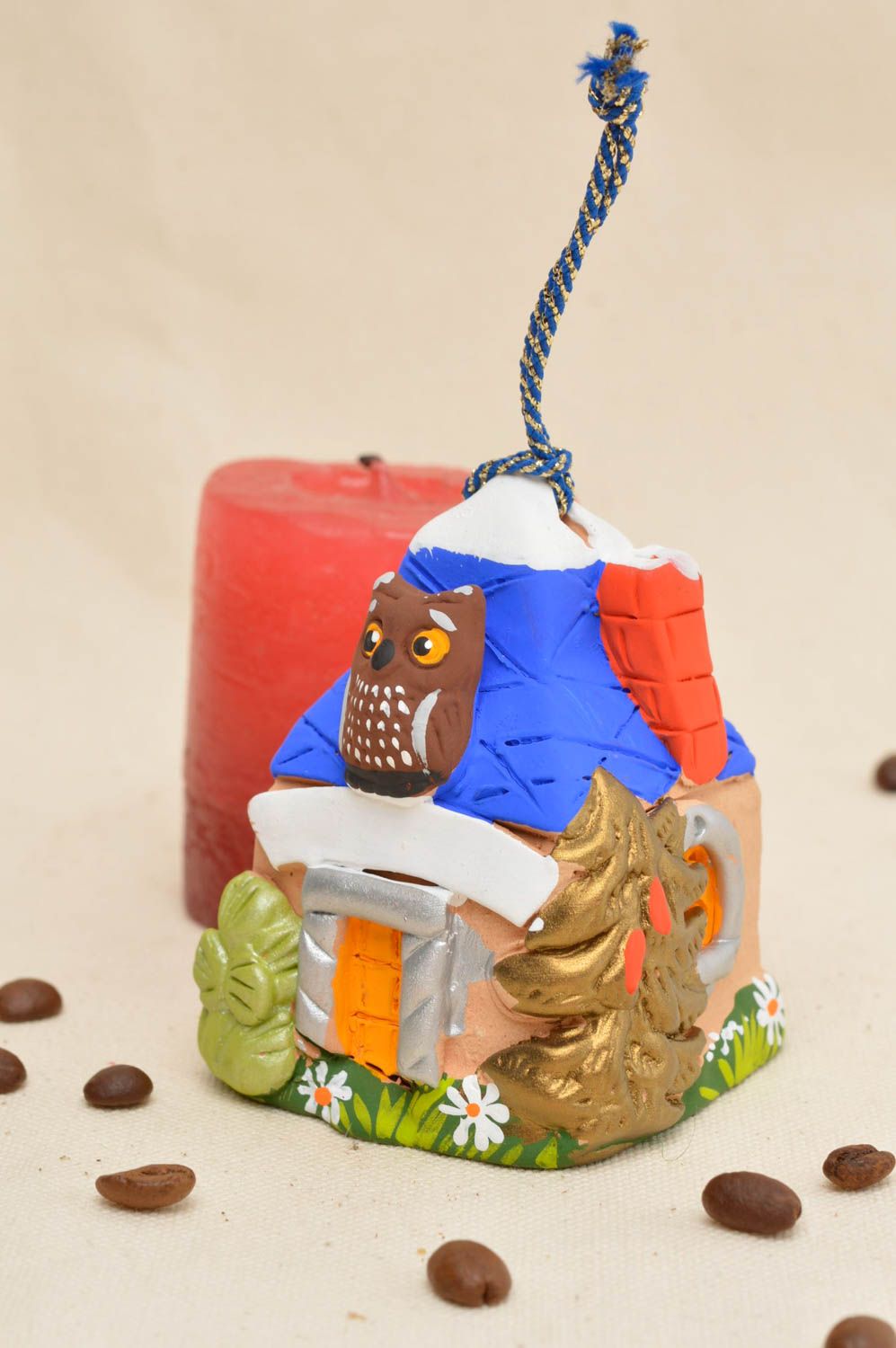 Campanella decorativa fatta a mano in ceramica con un laccio da appendere  foto 1