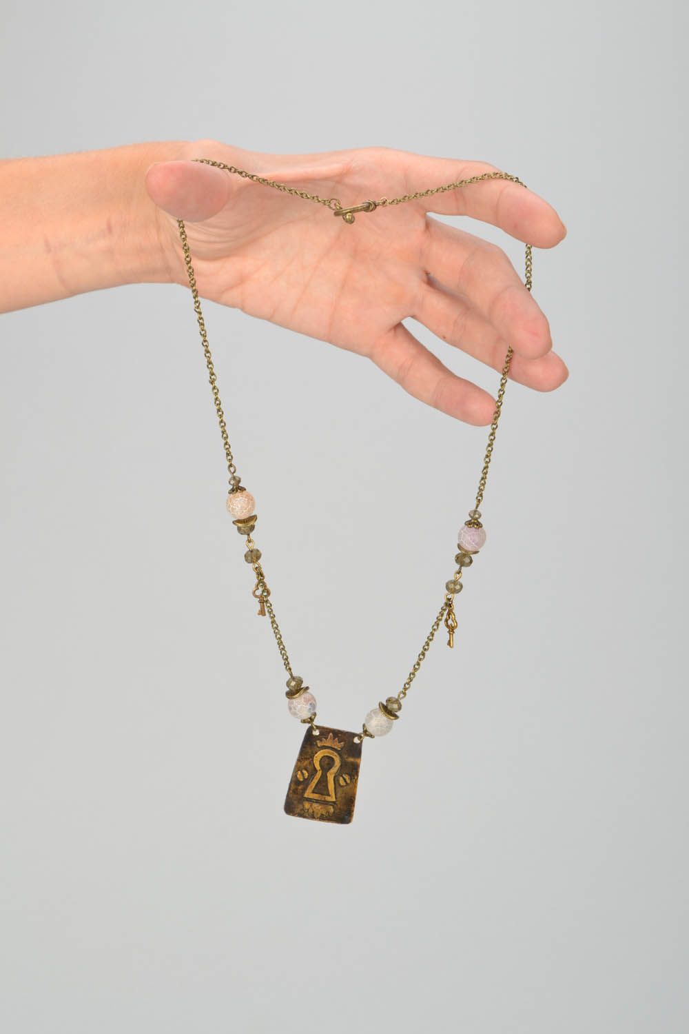 Collier pendentif en laiton avec agate Une serrure photo 2