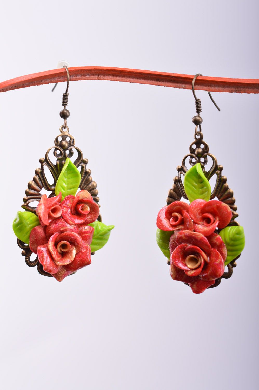 Handmade polymer clay drop earrings with charms in the shape of roses photo 2