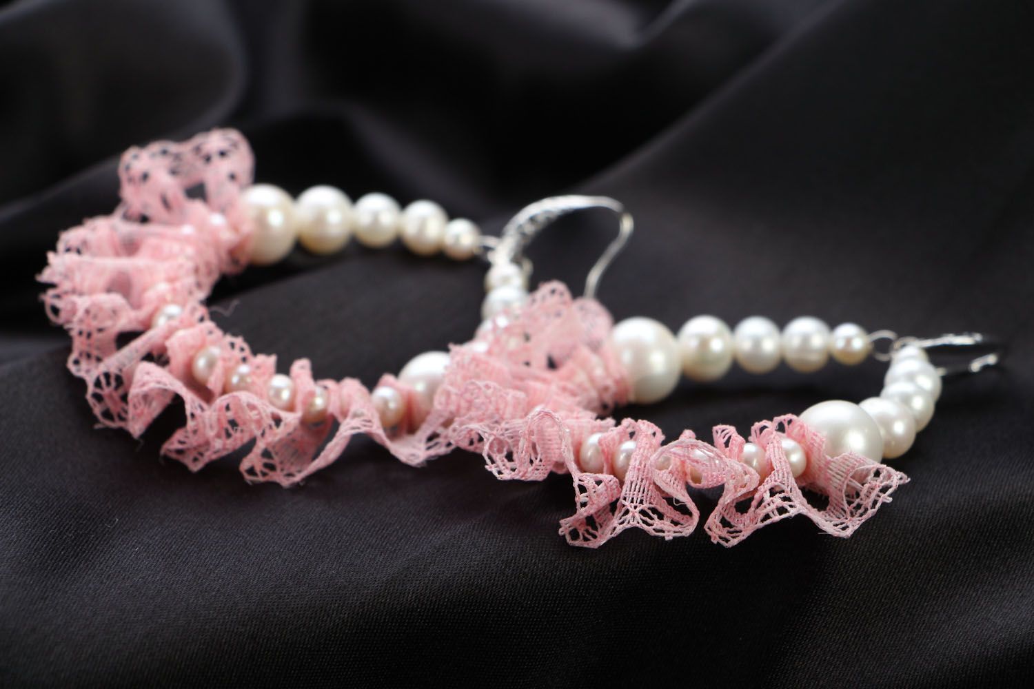 Beautiful earrings with pearls photo 2