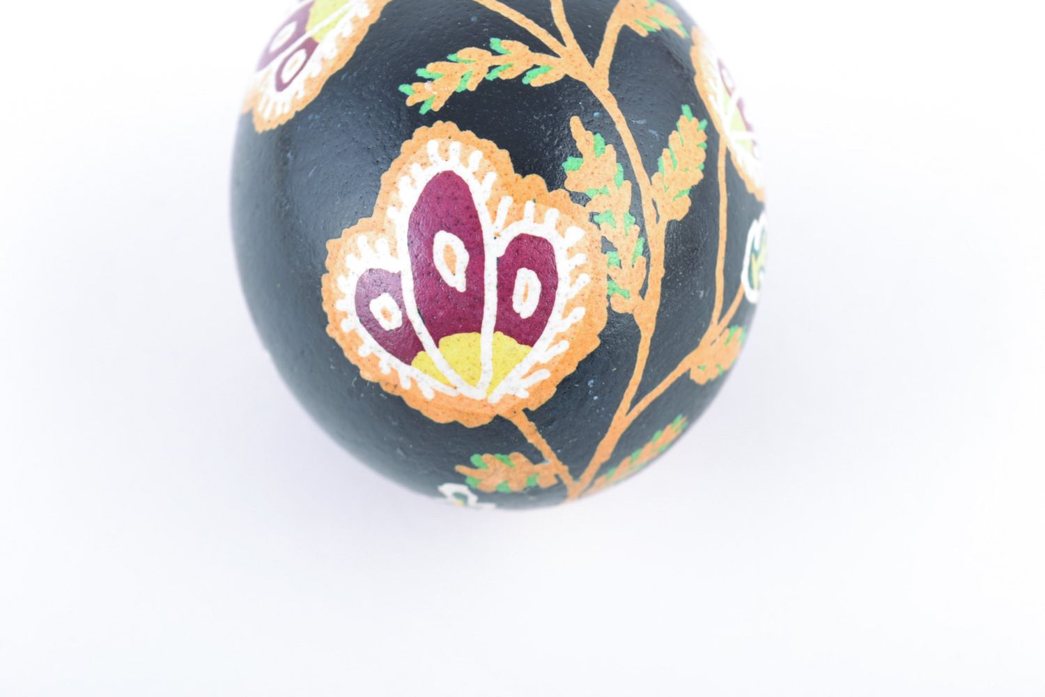 Handmade painted dark chicken Easter egg with flower pattern photo 3