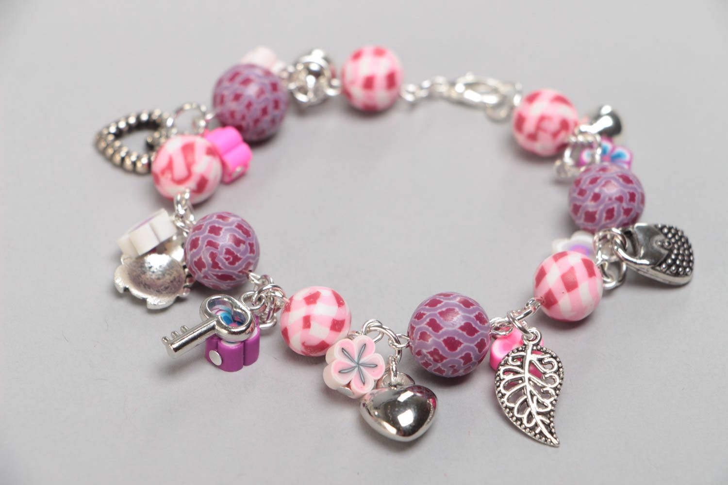 Handmade pink children's polymer clay wrist bracelet with charms photo 2