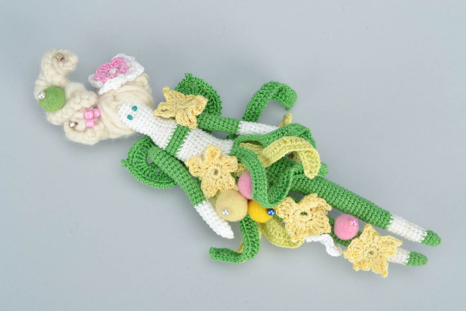 Beautiful small handmade crochet soft doll in green attire for girls photo 3