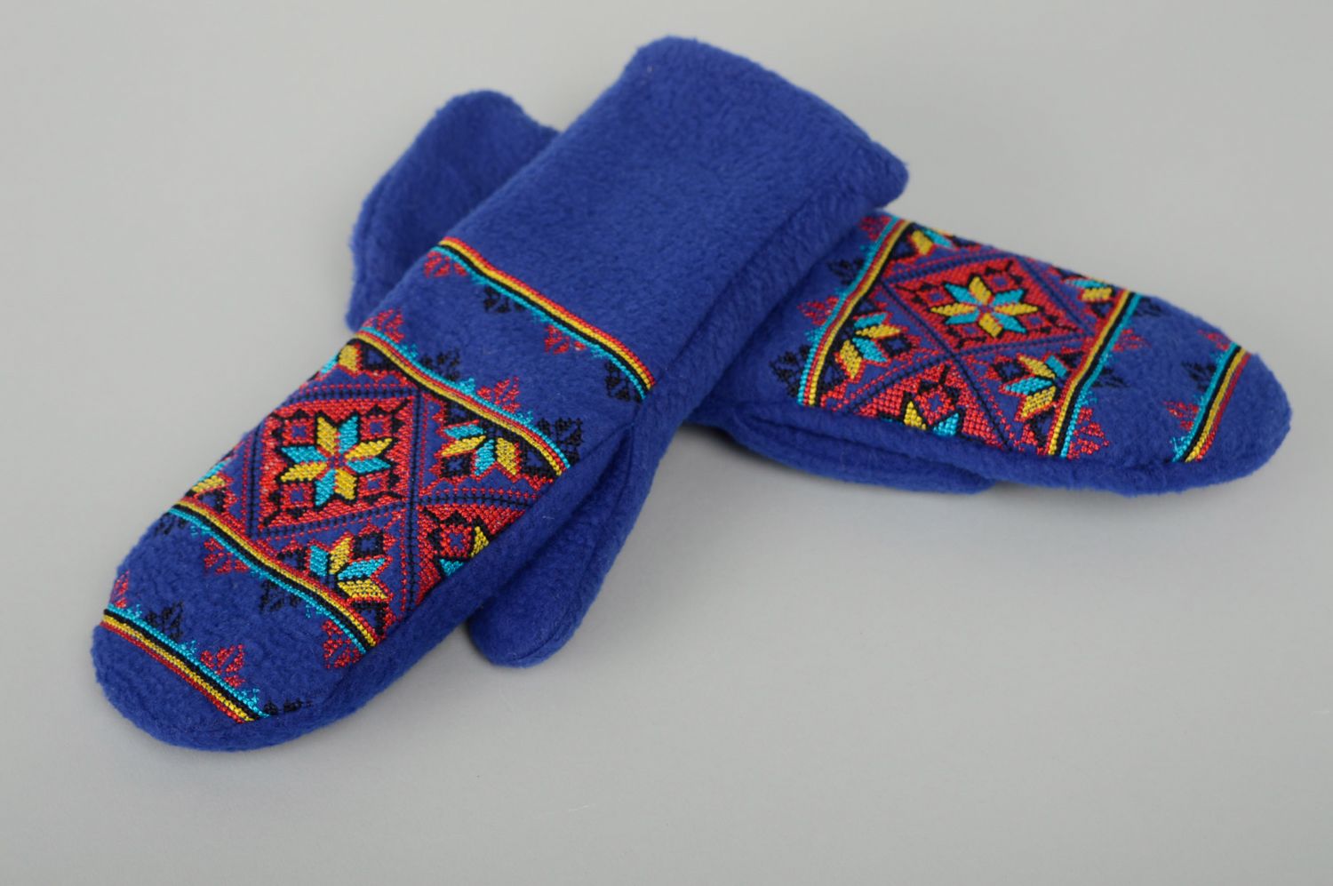 Warm blue fleece mittens with embroidery photo 1