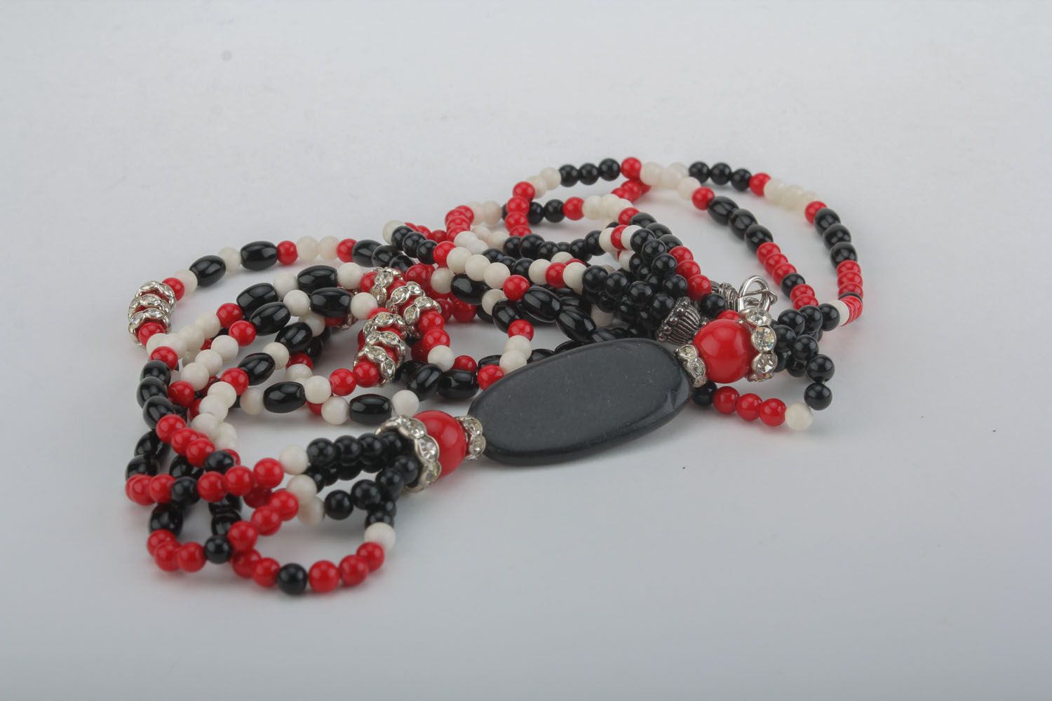 Red and black necklace with natural stones photo 2