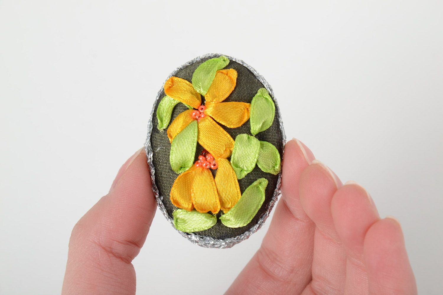 Handmade textile brooch with yellow flowers embroidered using satin ribbons photo 5