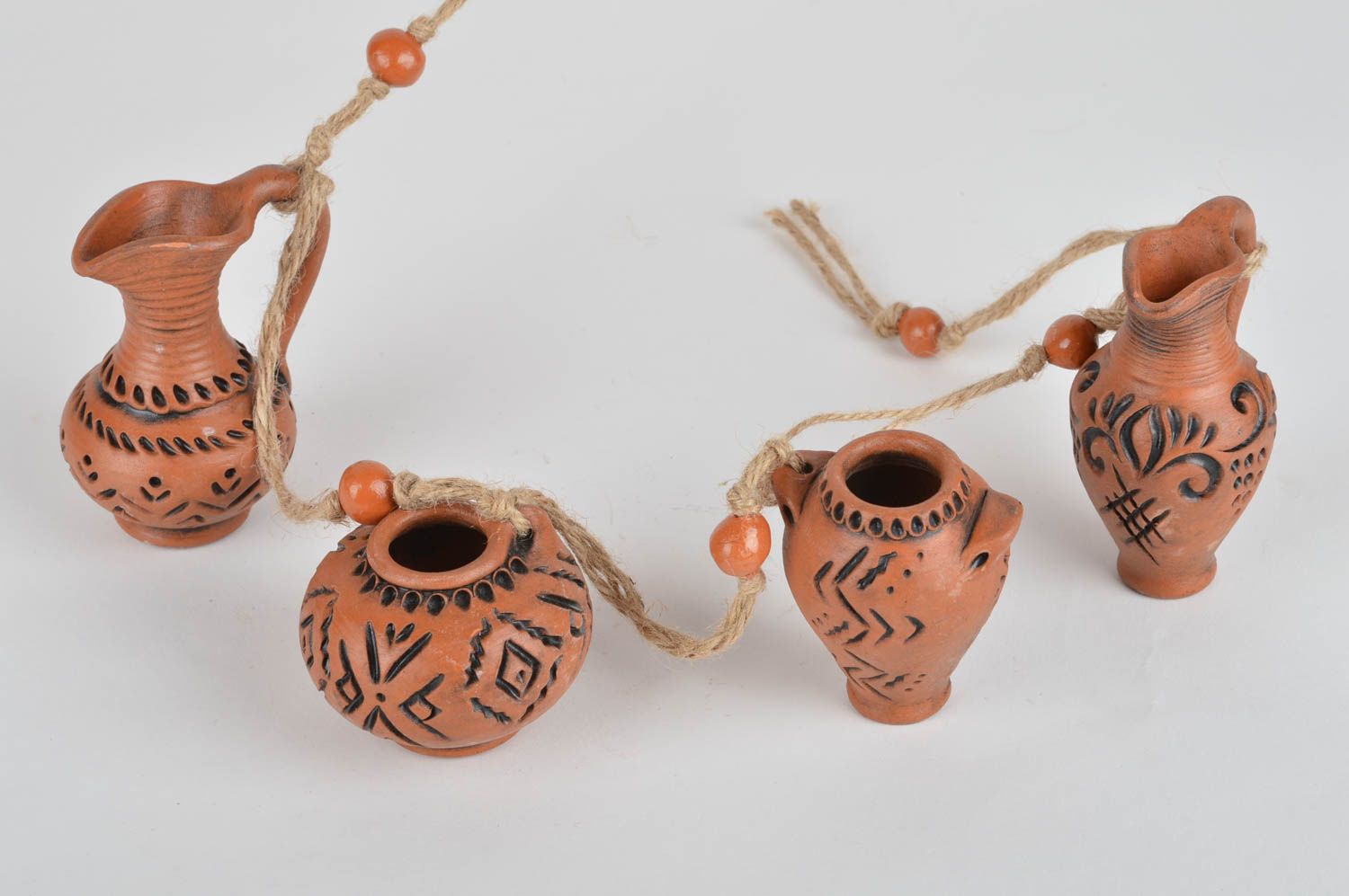 Designer interior pendant in shape of garland made of ceramic decanters photo 2