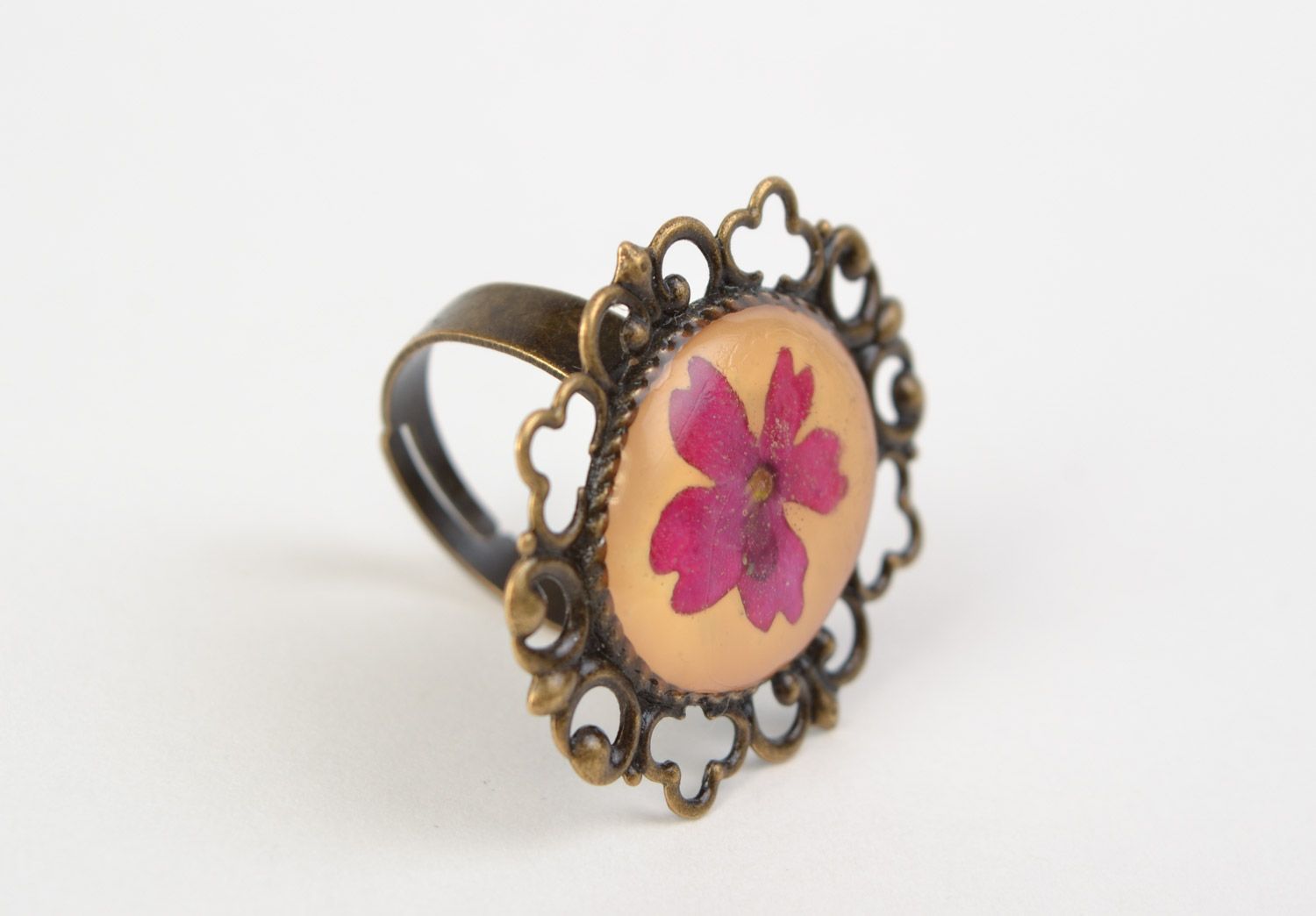 Handmade ring with vintage metal basis and real dried flower in jewelry resin  photo 3