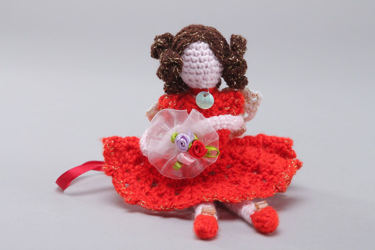 Handmade soft doll crocheted of cotton and acrylic threads girl in red dress photo 1