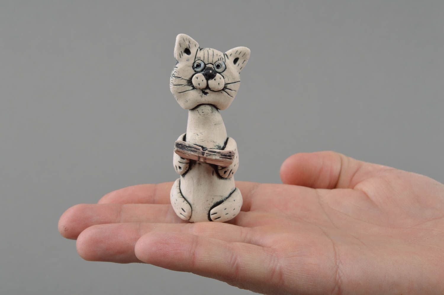 Porcelain handmade statuette painted with glaze and acrylics Cat with book photo 4