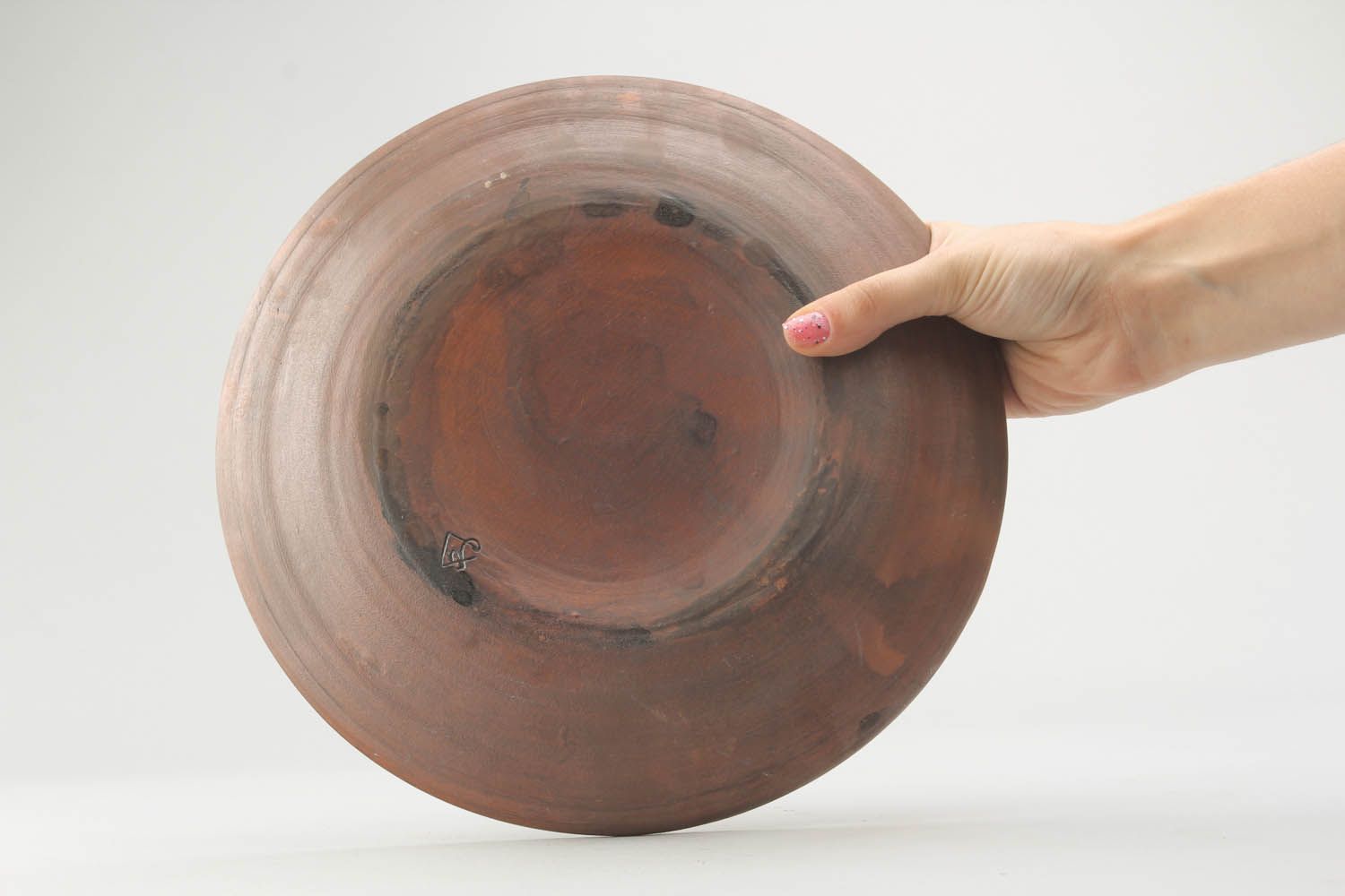 Plate made of red clay  photo 3