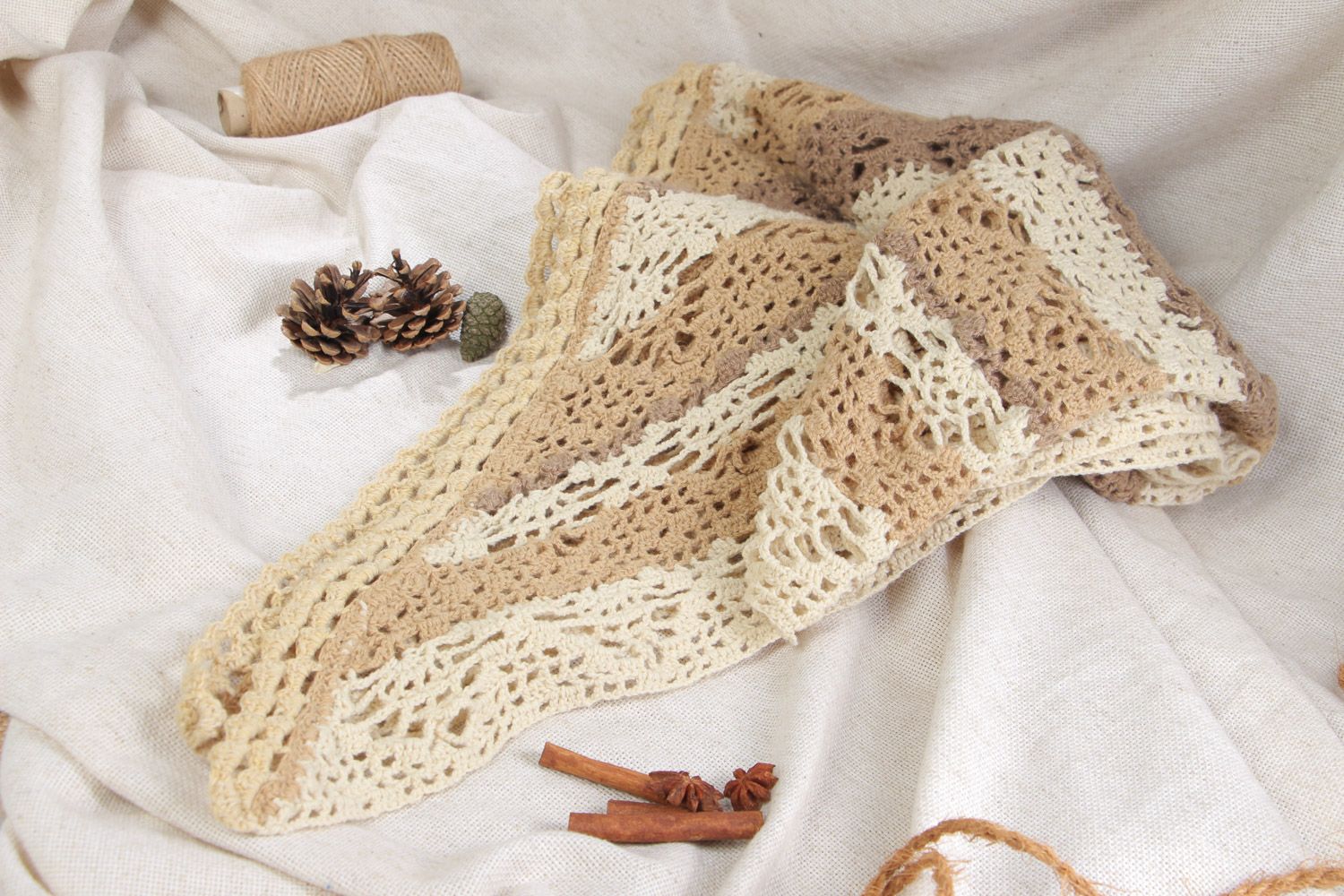 Handmade shawl of triangle shape crocheted of woolen threads of cream color photo 1