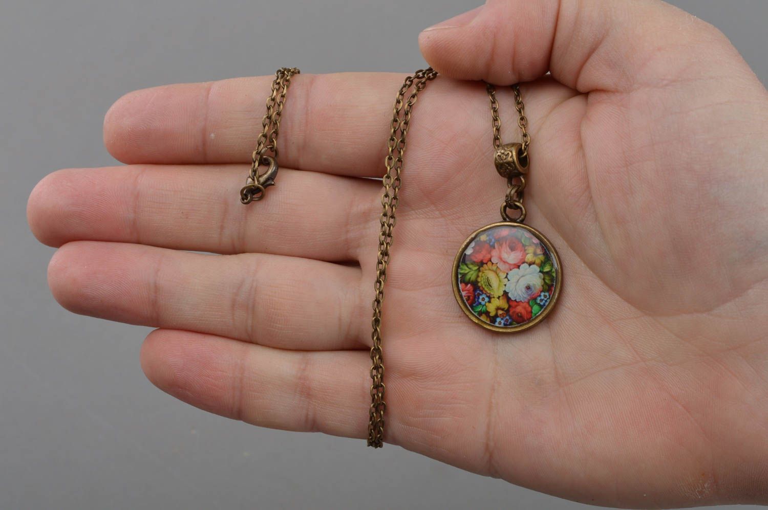 Handmade pendant with jewelry resin and print made using decoupage technique  photo 4