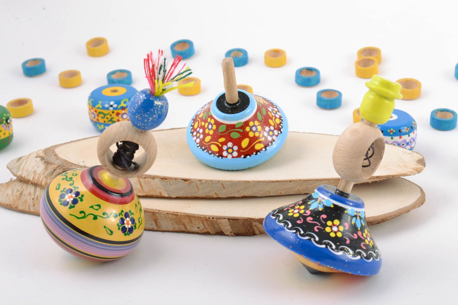Handmade painted wooden spinning tops set 3 pieces educational children's toys photo 1