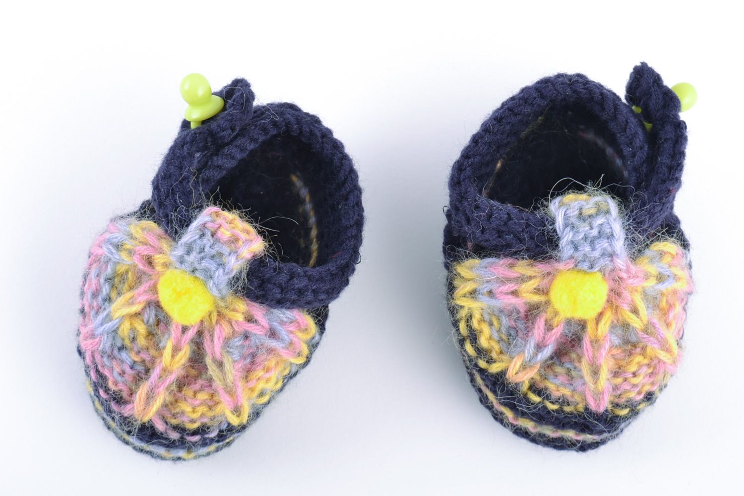 Hand knitted wool baby bootees of blue color photo 2
