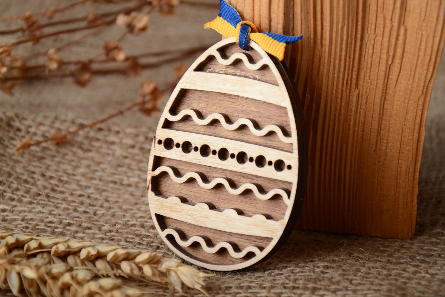 Two-layered plywood Easter egg with ornament photo 1