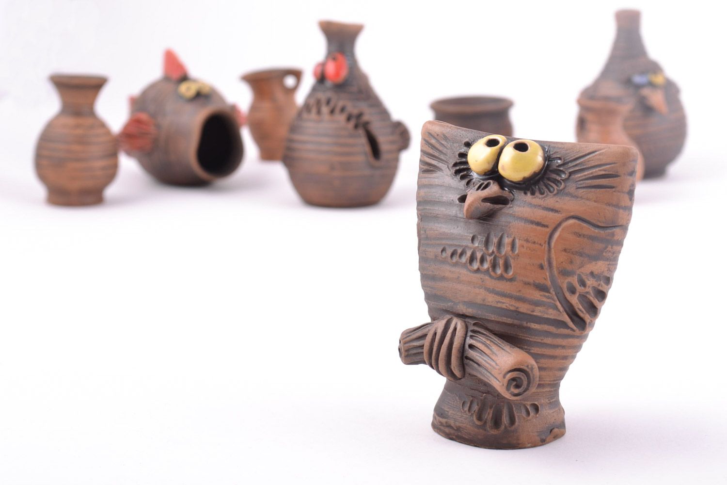 Handmade miniature souvenir ceramic statuette of funny owl of chocolate color photo 1