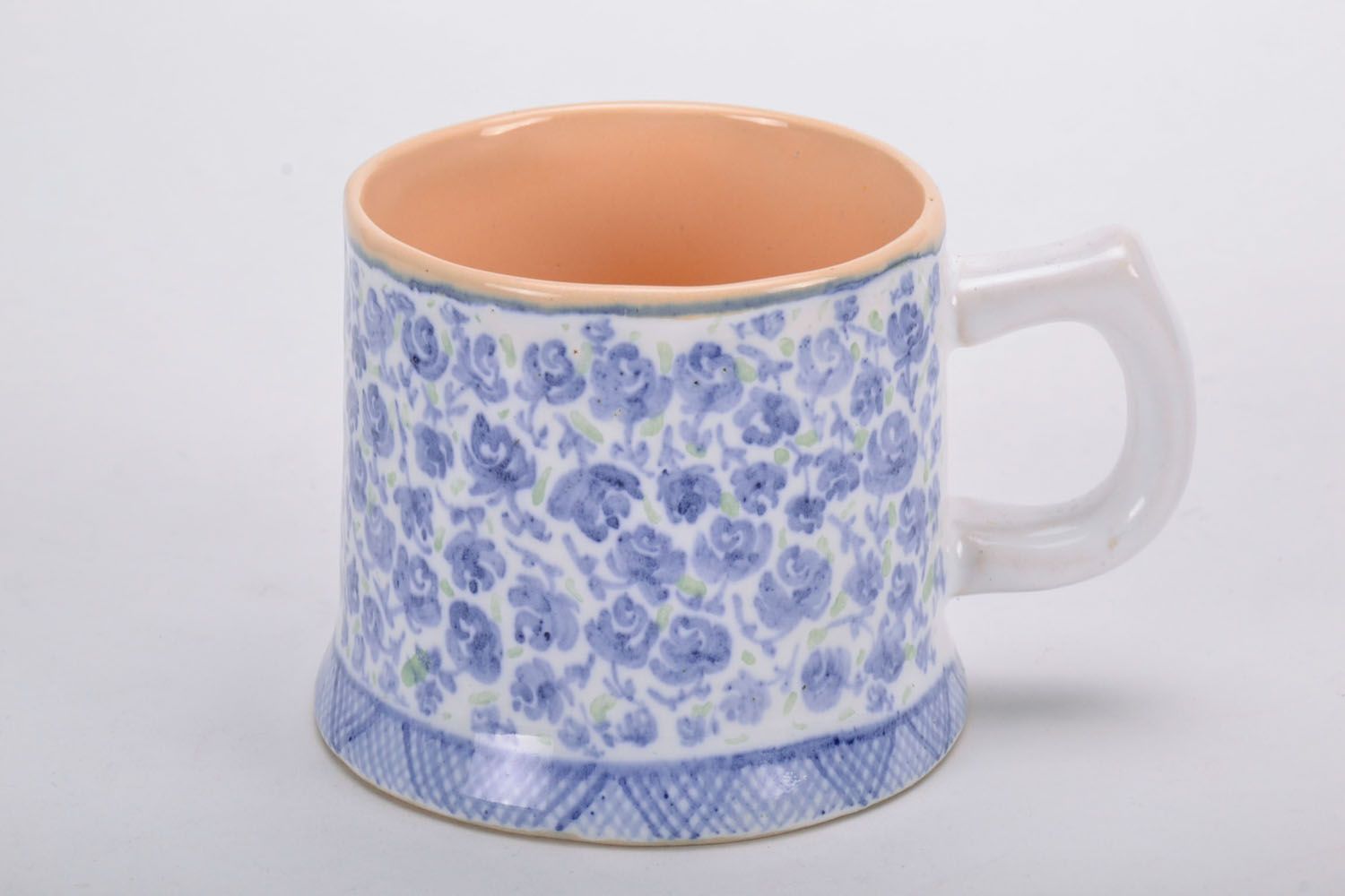 Handmade porcelain clay cup in white and violet color with handle and violets' pattern photo 2
