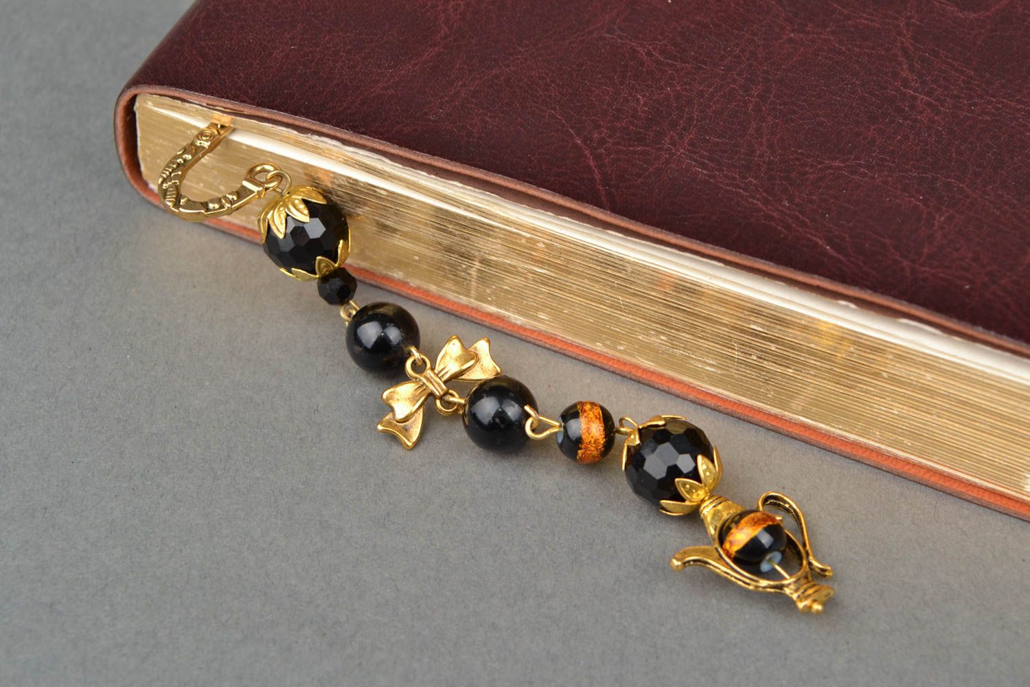 Golden-like bookmark with black beads photo 3