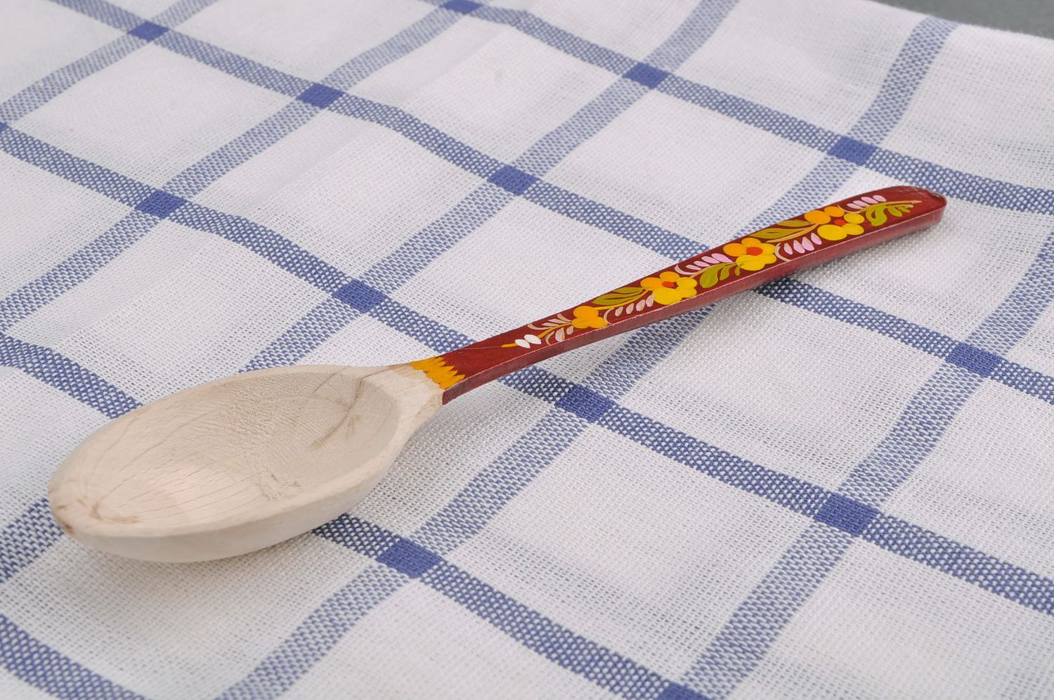Wooden teaspoon with red handle photo 1