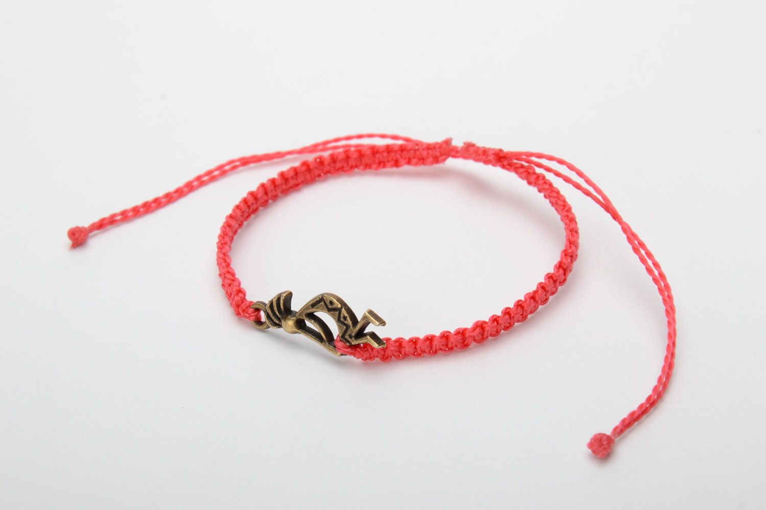 Handmade woven capron thread wrist bracelet of red color with charm photo 3