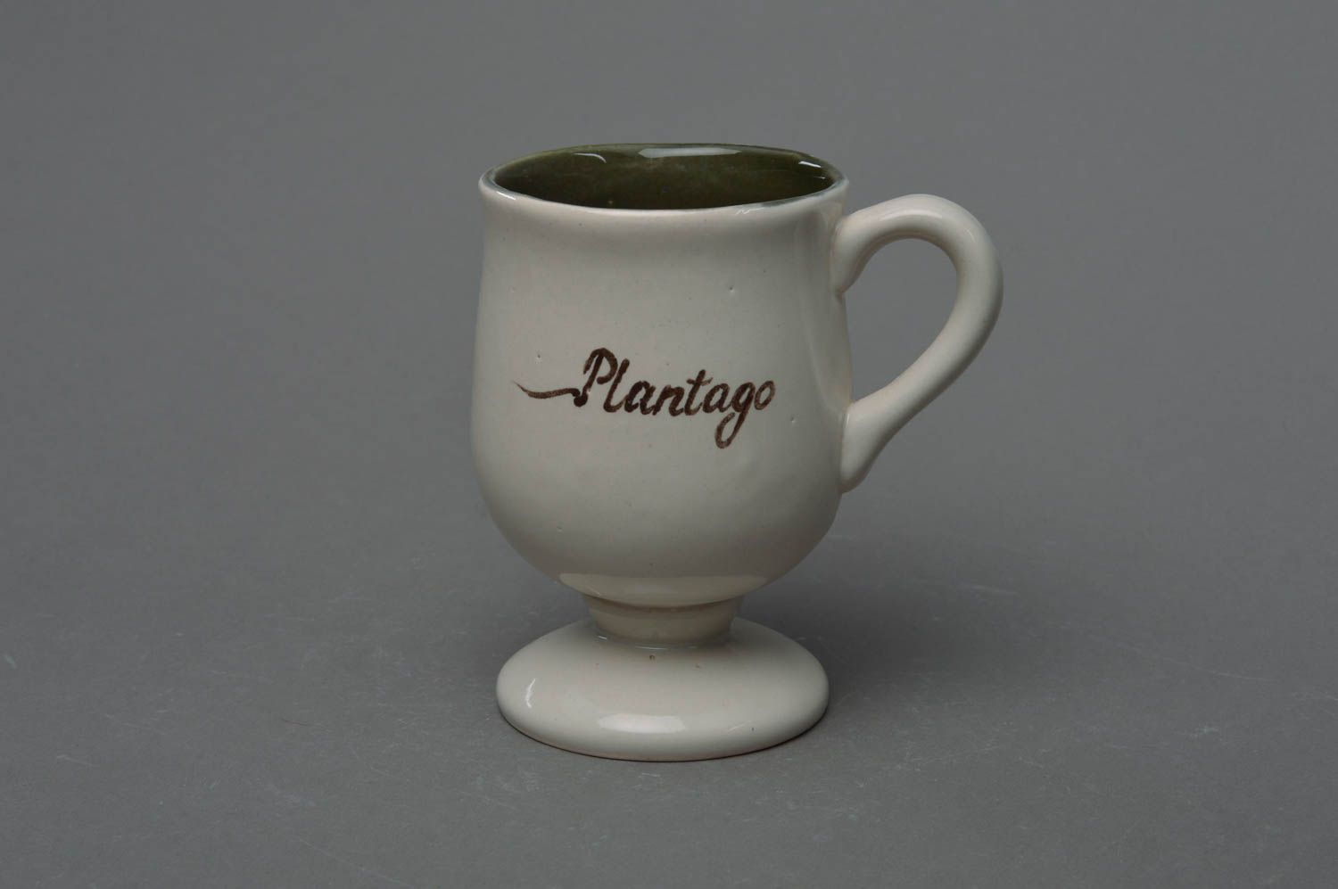Art ceramic clay glazed cup in white color with handle and floral pattern photo 2