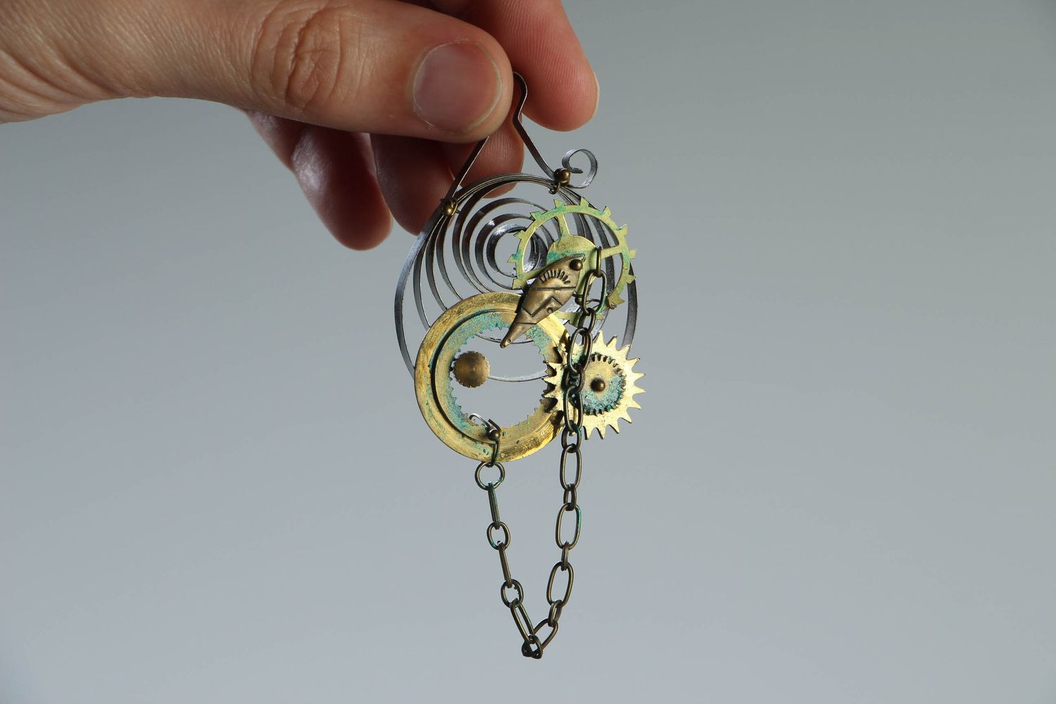 Unusual pendant with clock mechanism photo 4