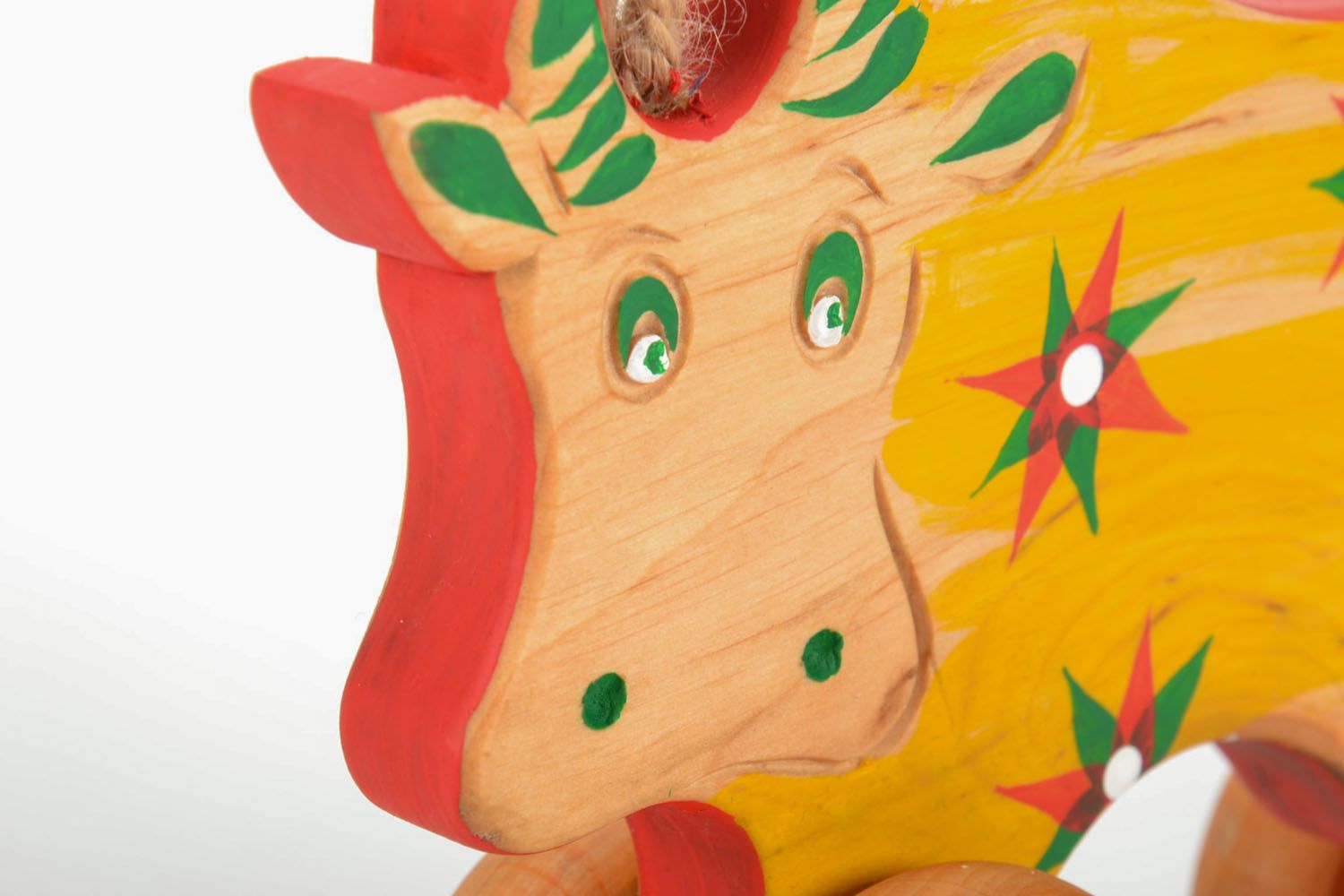 Деревянная игрушка-качалка в виде коровки фото 4
