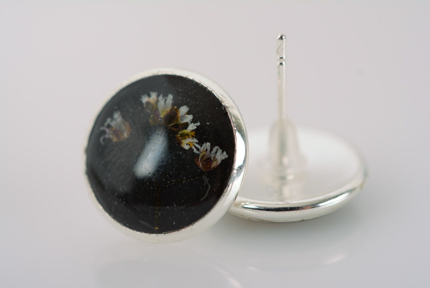 Homemade small black stud earrings with dried flower embedded in epoxy resin photo 5