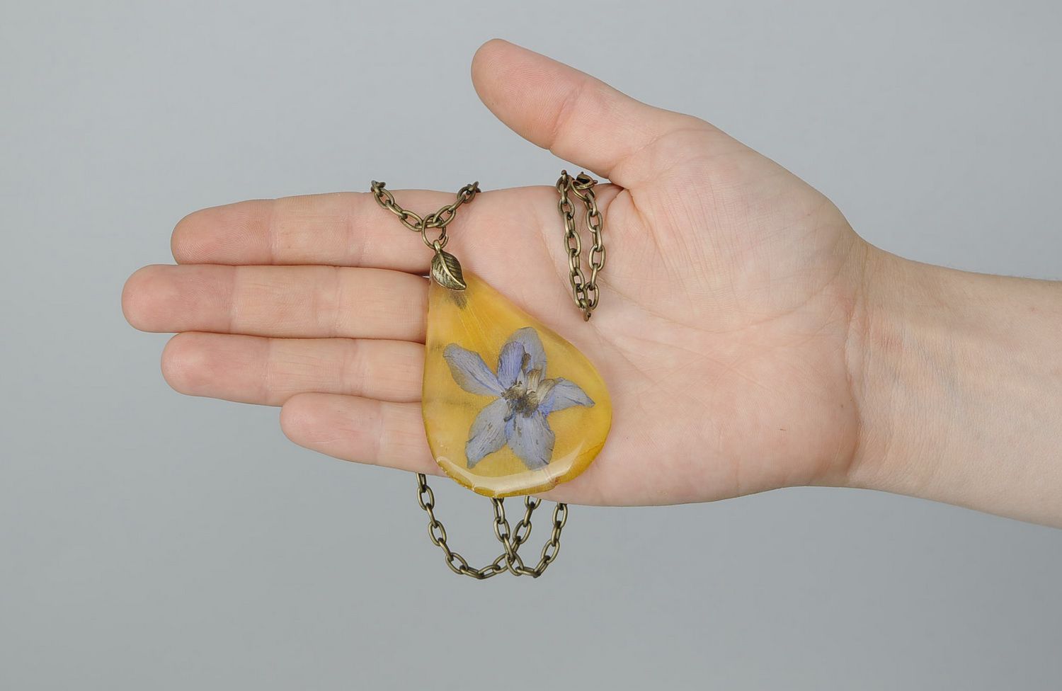 Pendant covered with epoxy Petal of tulips and delphinium photo 5