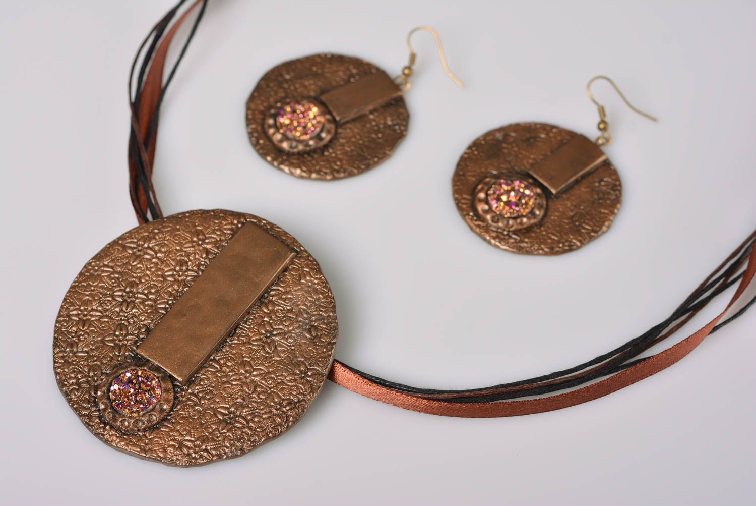 Handmade polymer clay jewelry set of bronze color earrings and pendant on ribbon photo 1