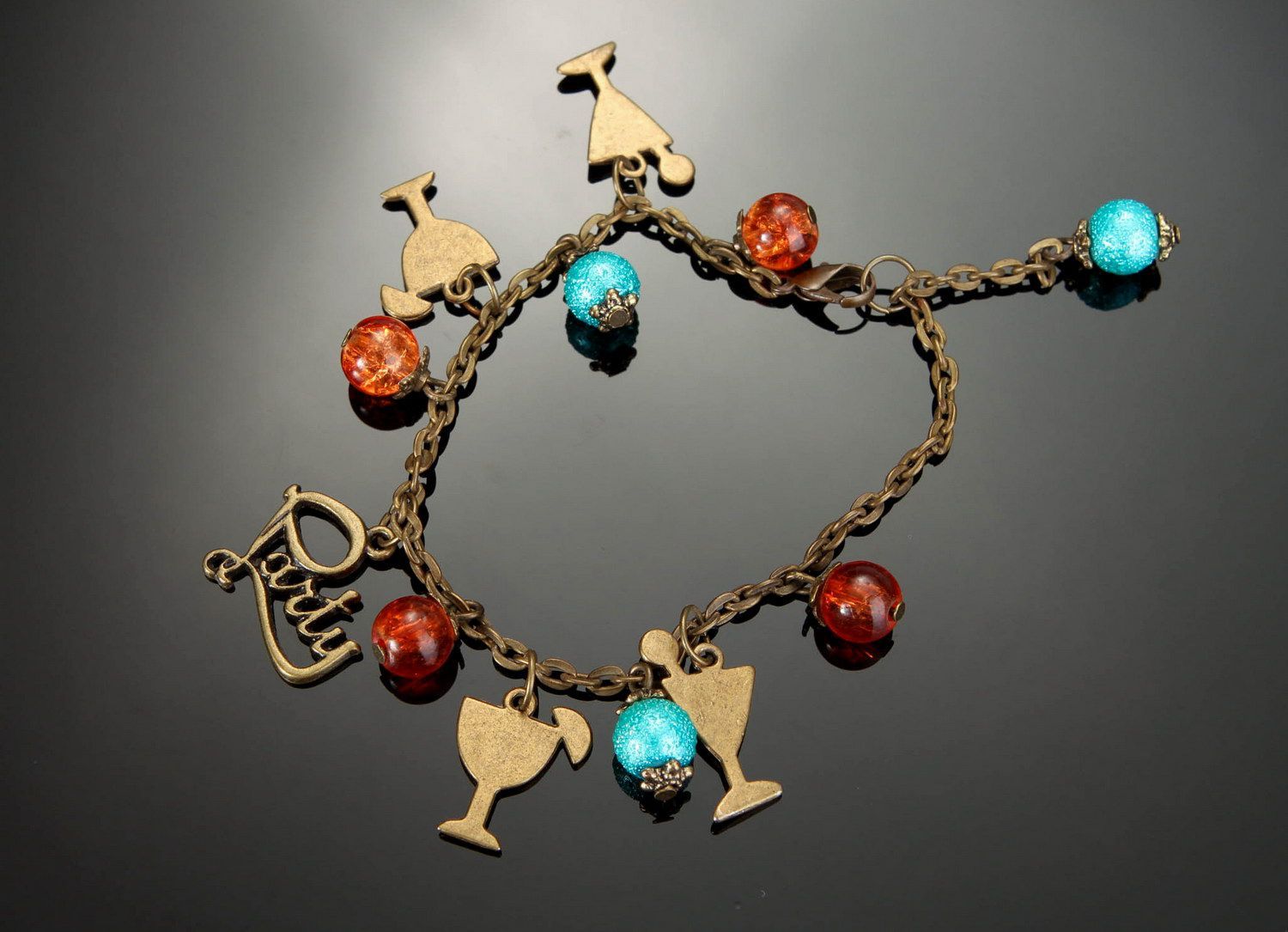 Bracelet fait main en verre et bronze avec perles céramiques photo 2