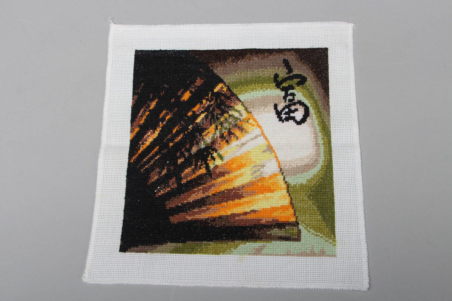 Cross stitched picture Health photo 1