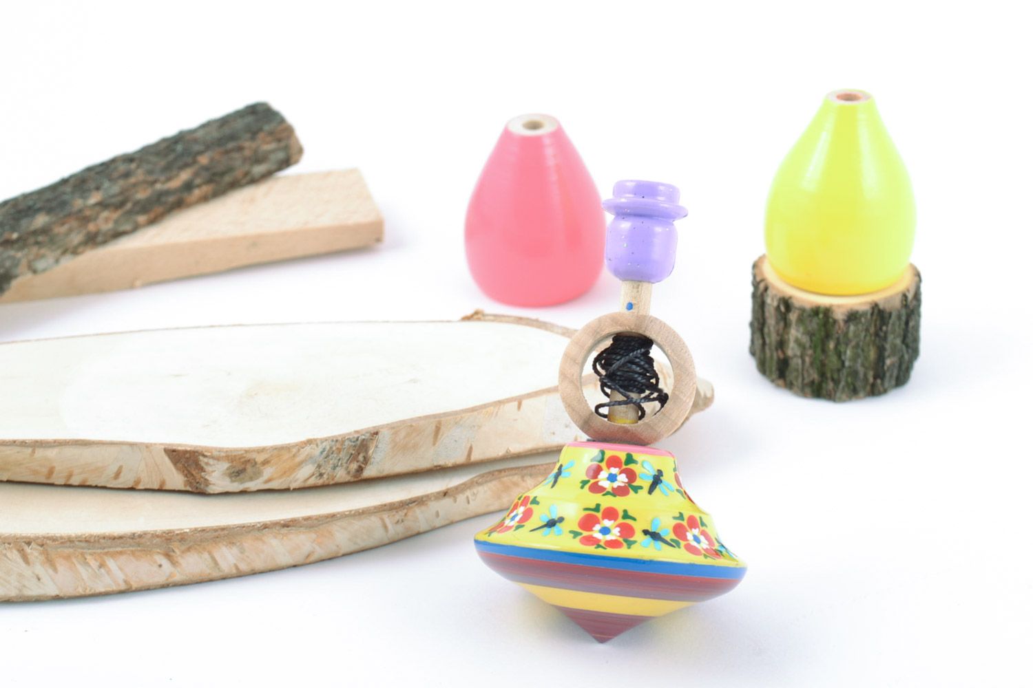 Деревянный волчок игрушка развивающая ручной работы расписной цветной с кольцом фото 2
