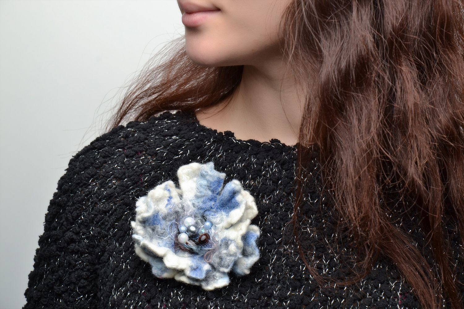Felted wool brooch in the shape of white and blue flower photo 2