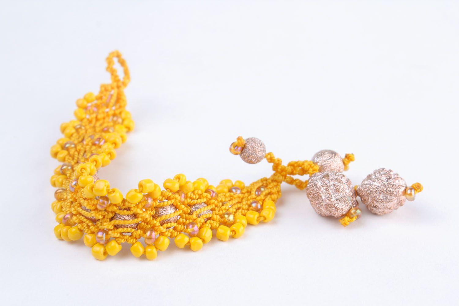 Bracelet tressé avec perles de rocailles femme photo 4