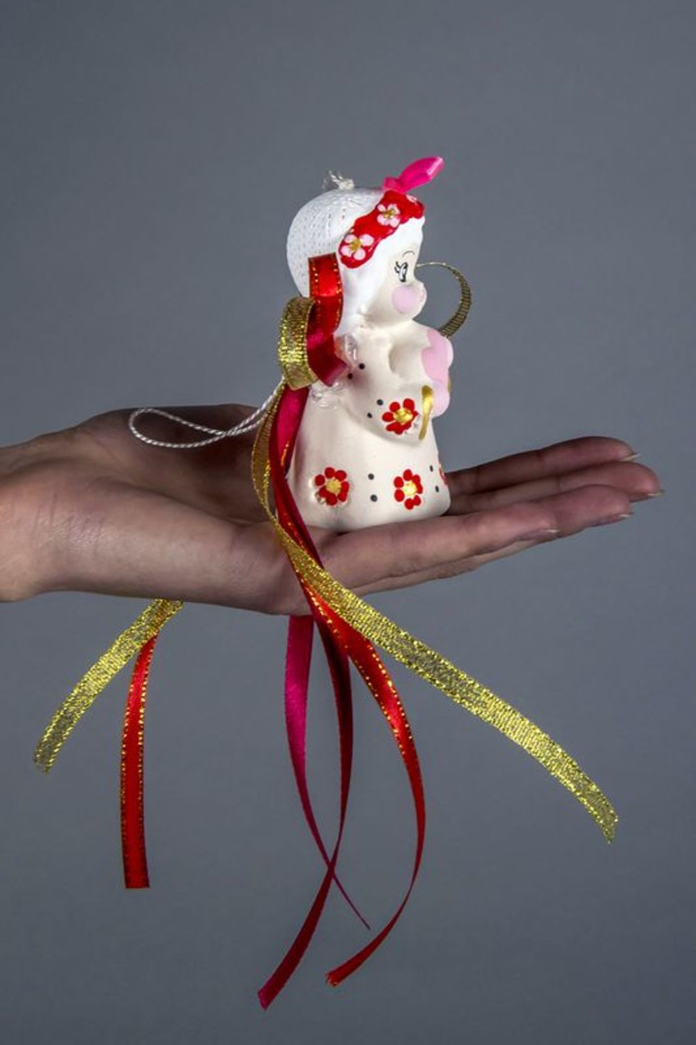 Ceramic bell with red ribbons photo 3