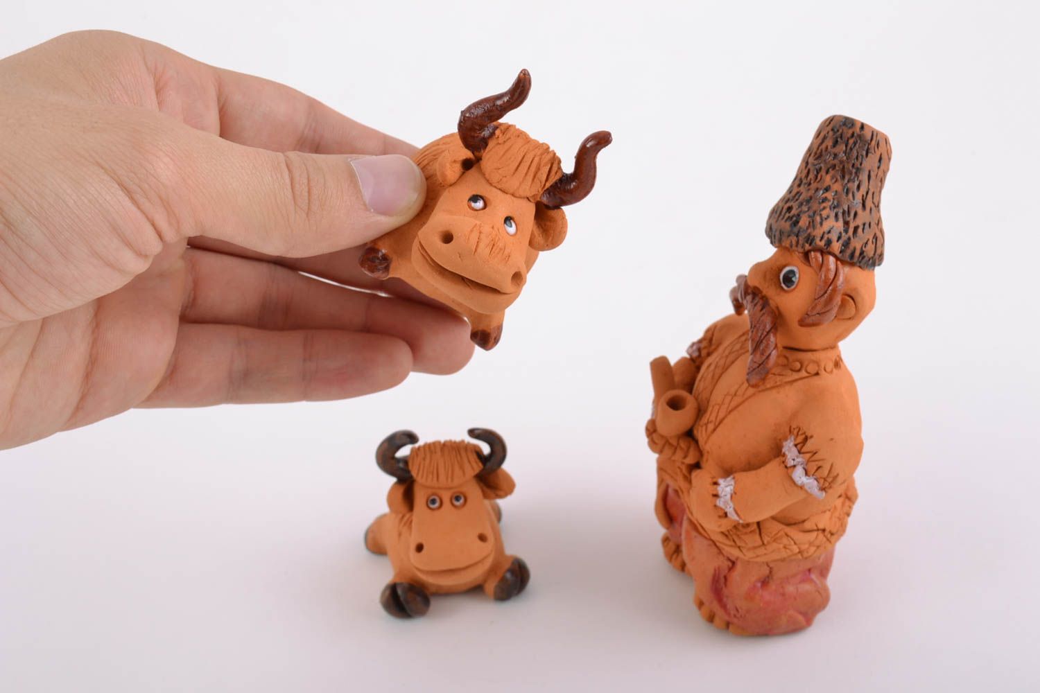 Set of 3 handmade ceramic figurines in ethnic style the Cossack with 2 bulls photo 4