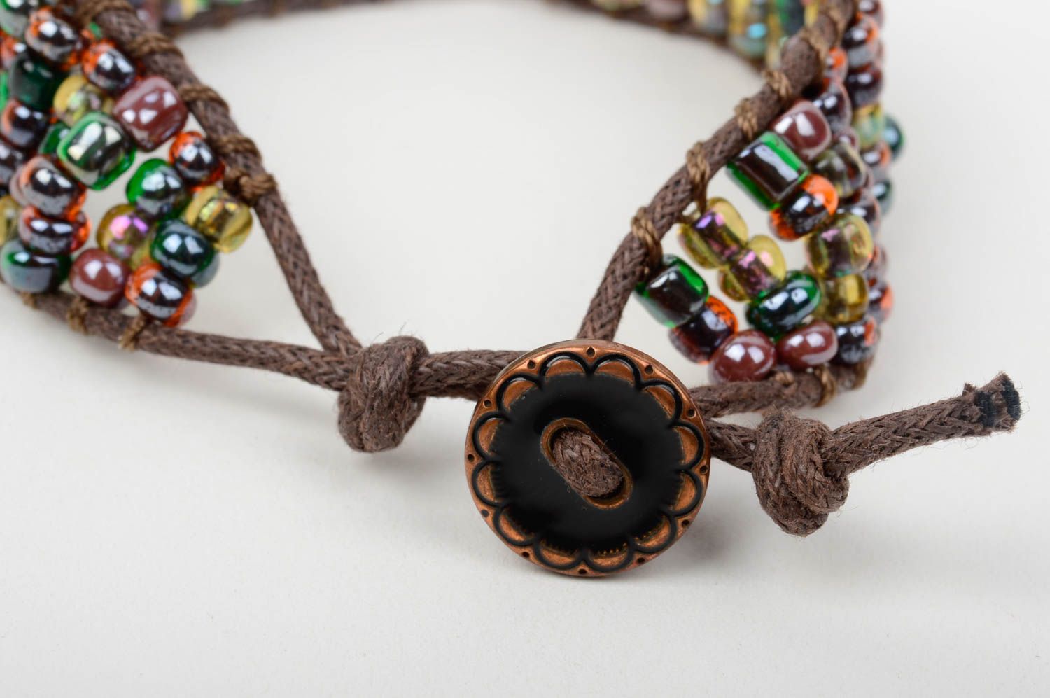 Brown color cord strand beaded bracelet with brown and dark green beads photo 4