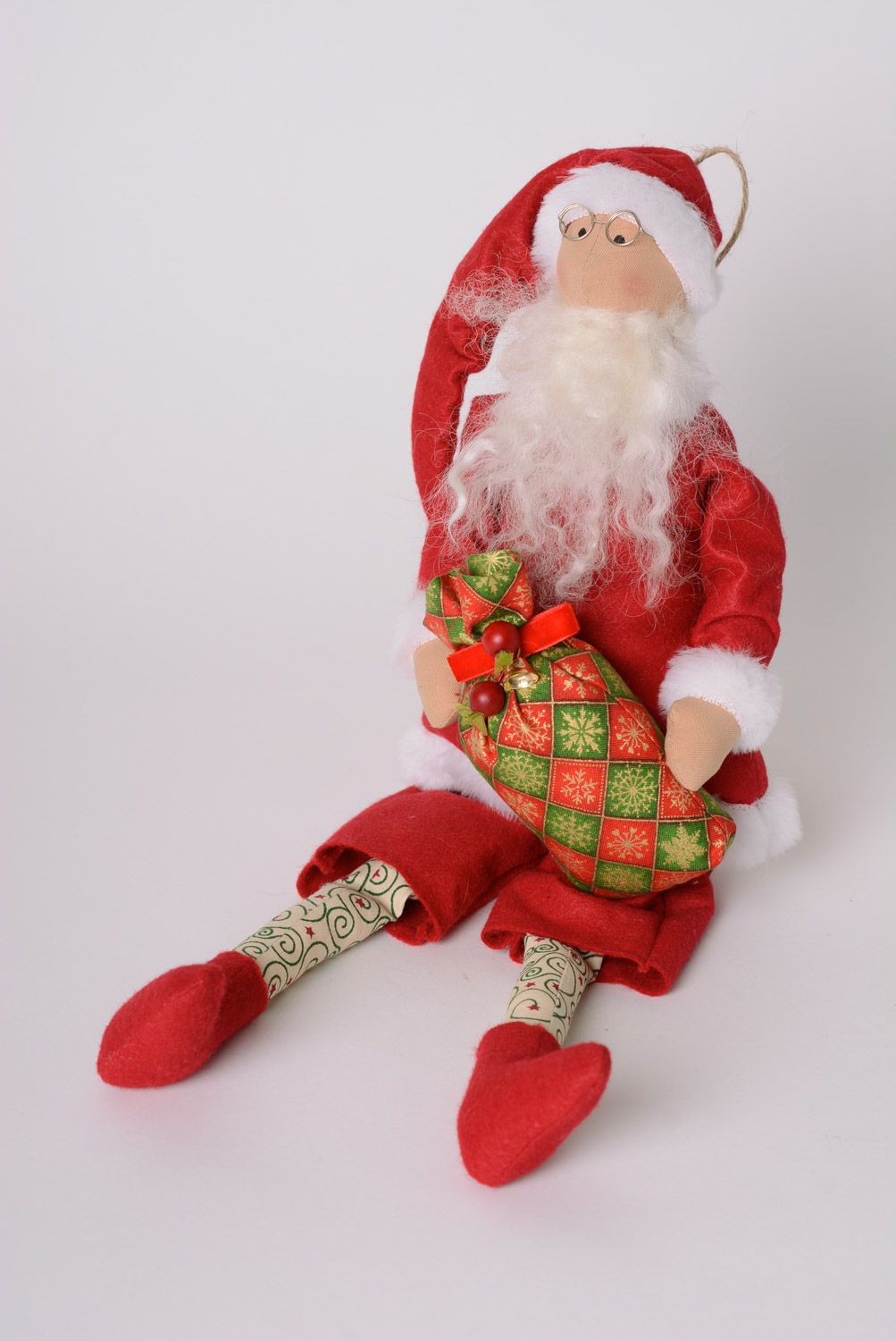 Funny handmade soft toy of average size fabric Santa Claus photo 1