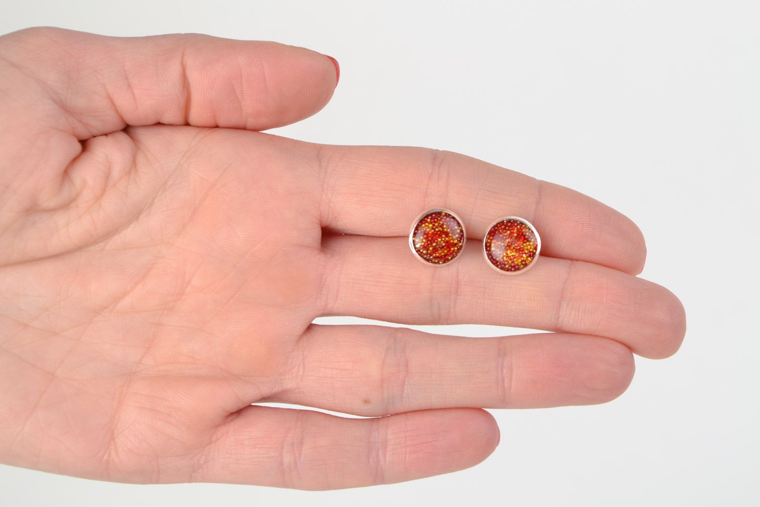 Handmade round epoxy resin stud earrings of red and yellow colors for women photo 2