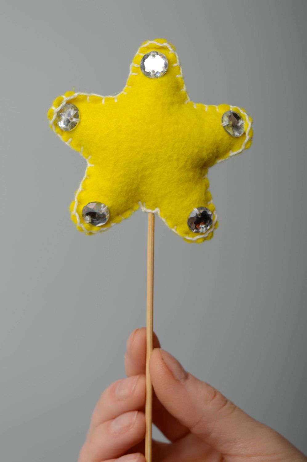 Palito para decorar macetas con forma de estrella amarilla foto 4
