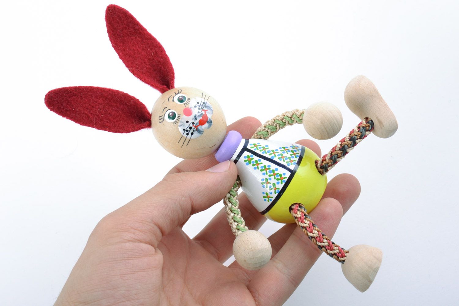 Handmade painted wooden eco toy rabbit with red ears and cord paws for children photo 2