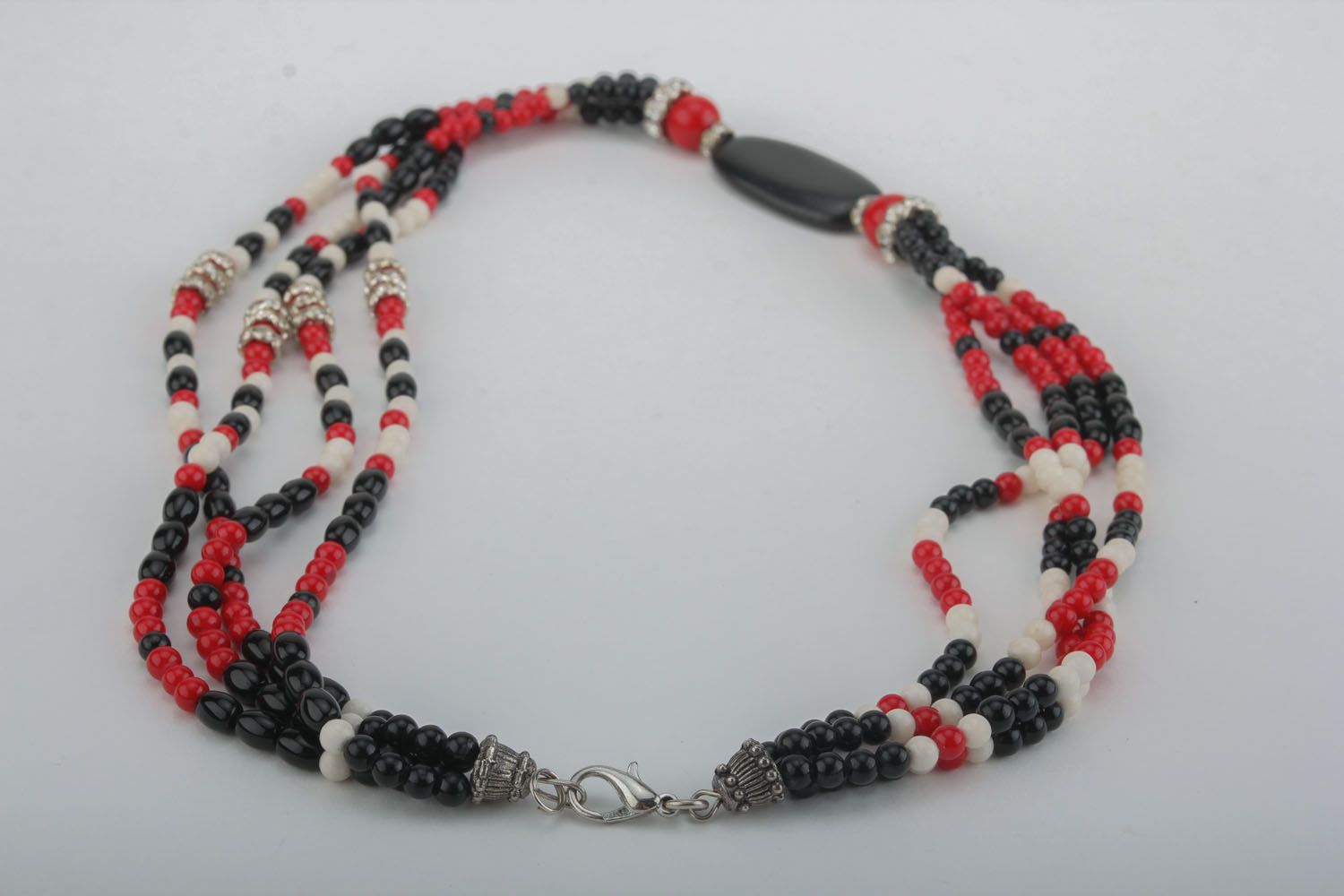Red and black necklace with natural stones photo 1
