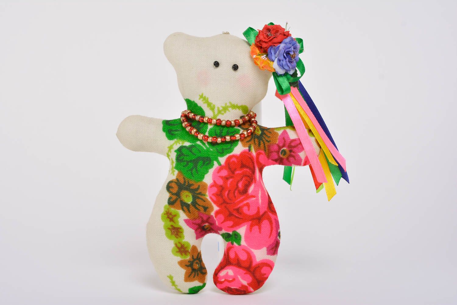 Handmade designer small soft toy sewn of motley cotton fabric bear with flowers photo 1