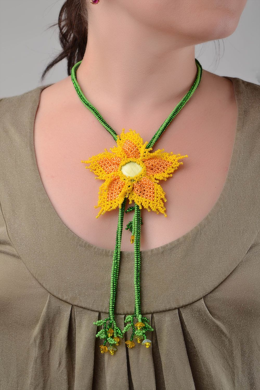 Bright long handmade necklace made of beads and natural stones Yellow flower photo 1