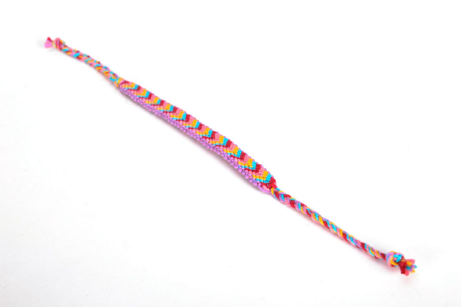 Bracelet tressé en fils multicolores fait main photo 2
